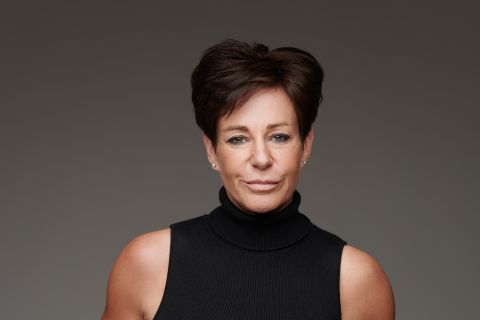 Hi Res image of Penny Mallory keynote speaker standing with her hands on her legs